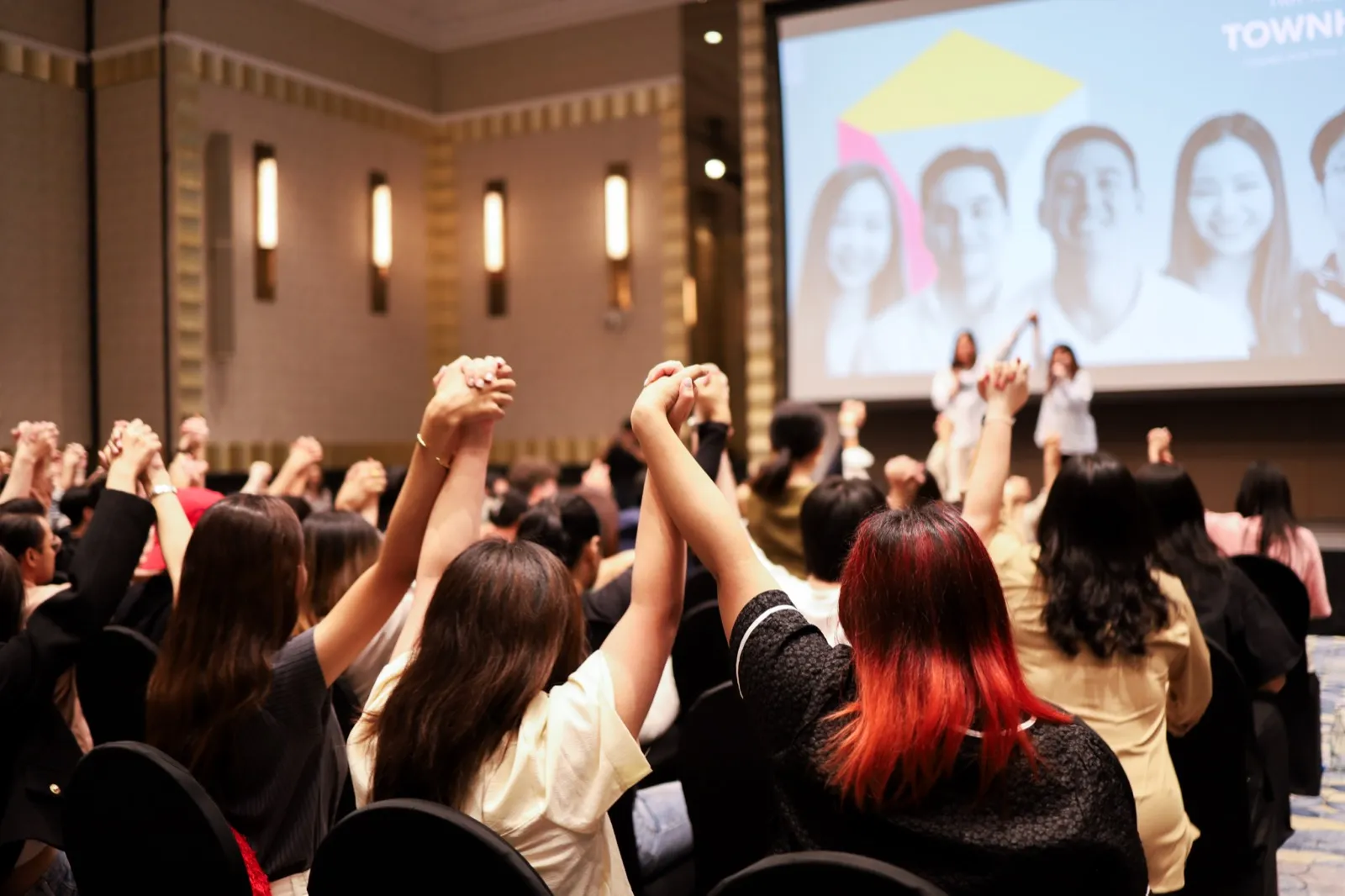 The audience applauding at an awards evening