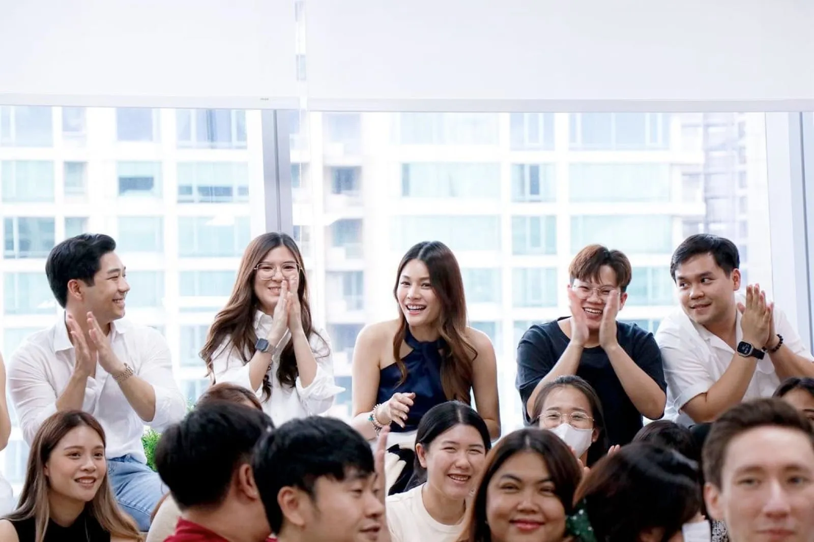 The Primal team applauding at a company event