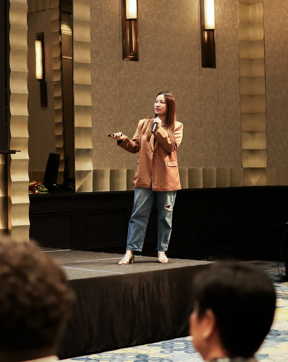 A Primal team member speaking on stage
