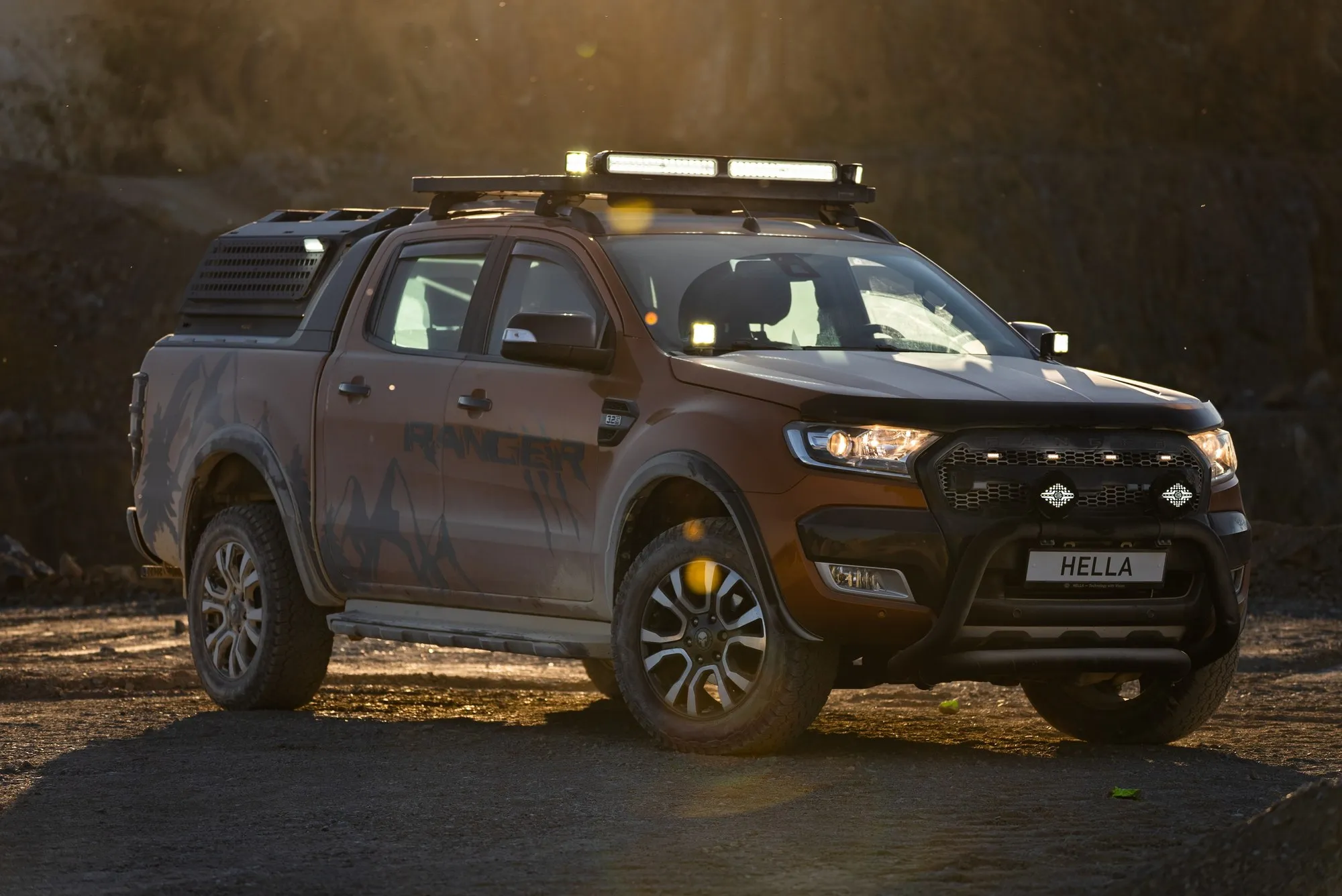 A Ford Ranger fitted with HELLA light bars at dusk