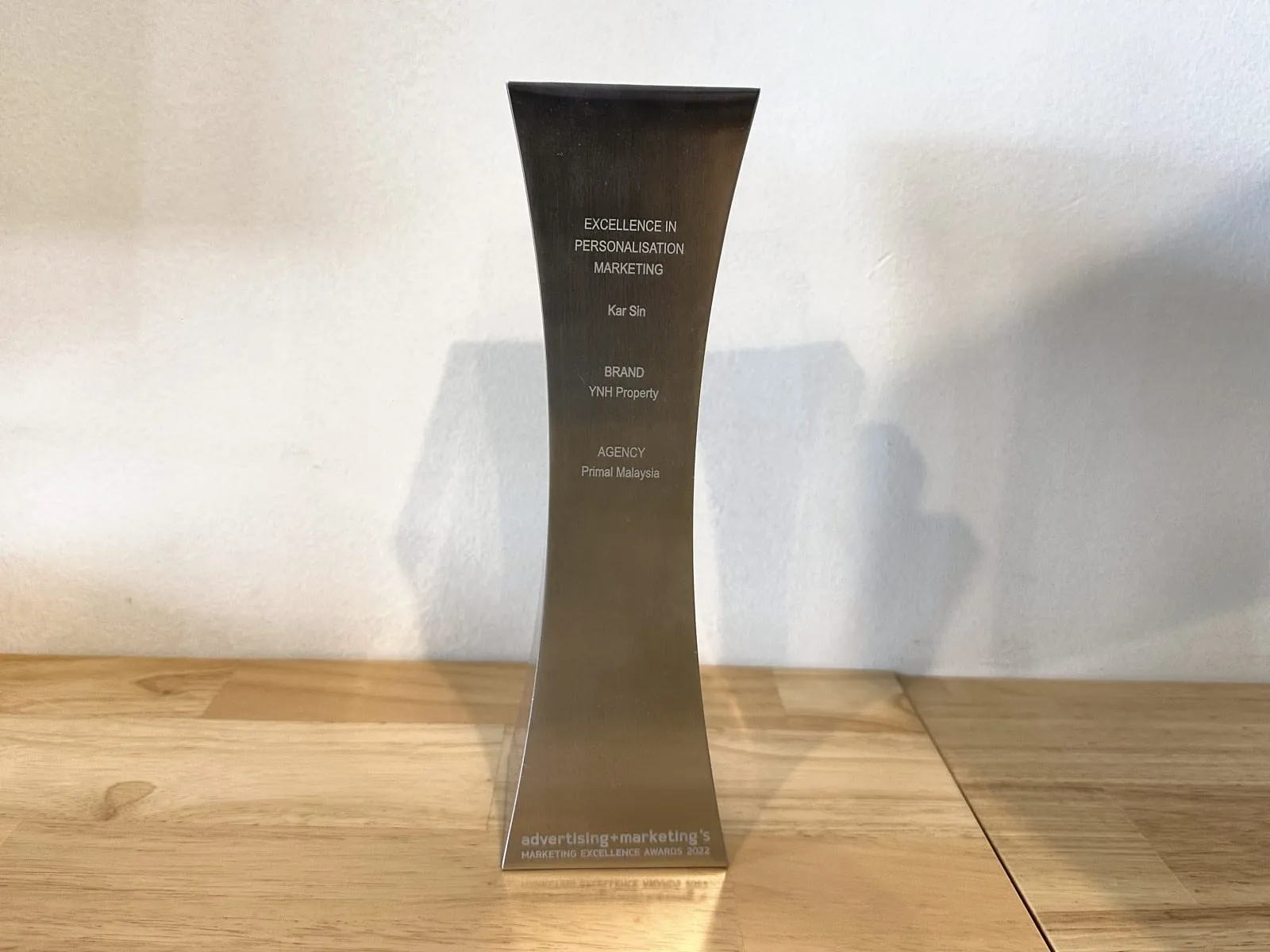 The Marketing Excellence Awards 2022 trophy for Excellence in Personalisation Marketing, engraved for YNH Property and Primal