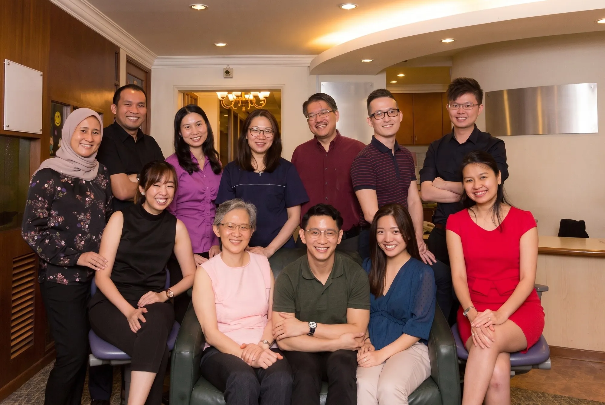 The Sim & Hooi Dental Care team in the clinic reception