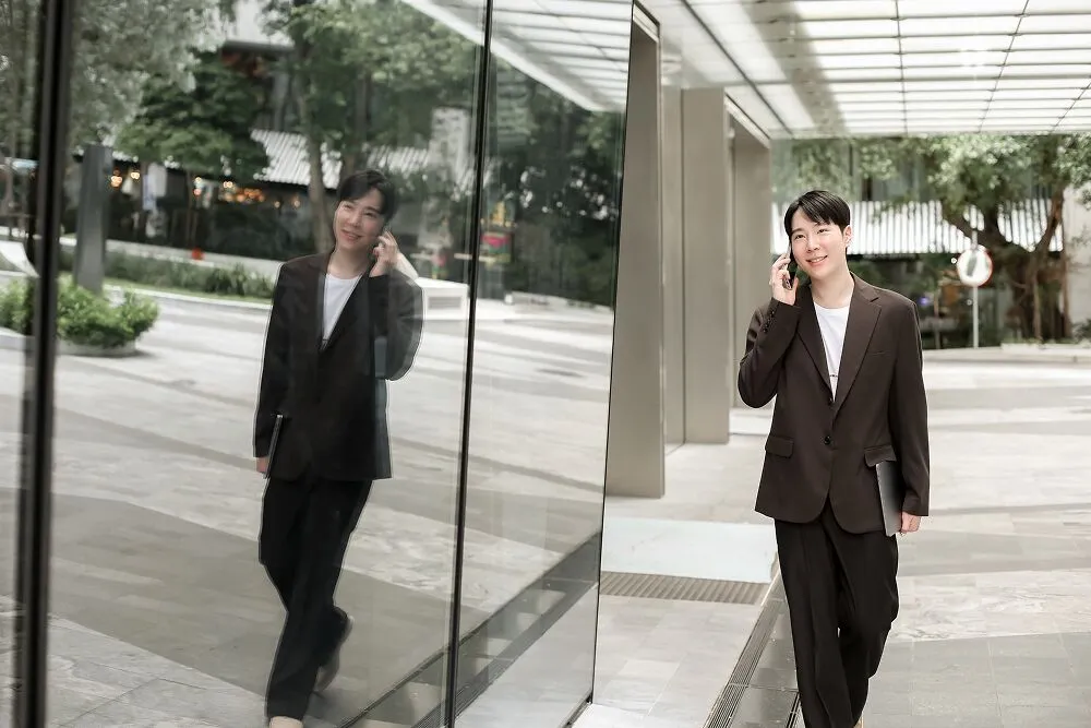 A Primal strategist on a phone call outside the office building