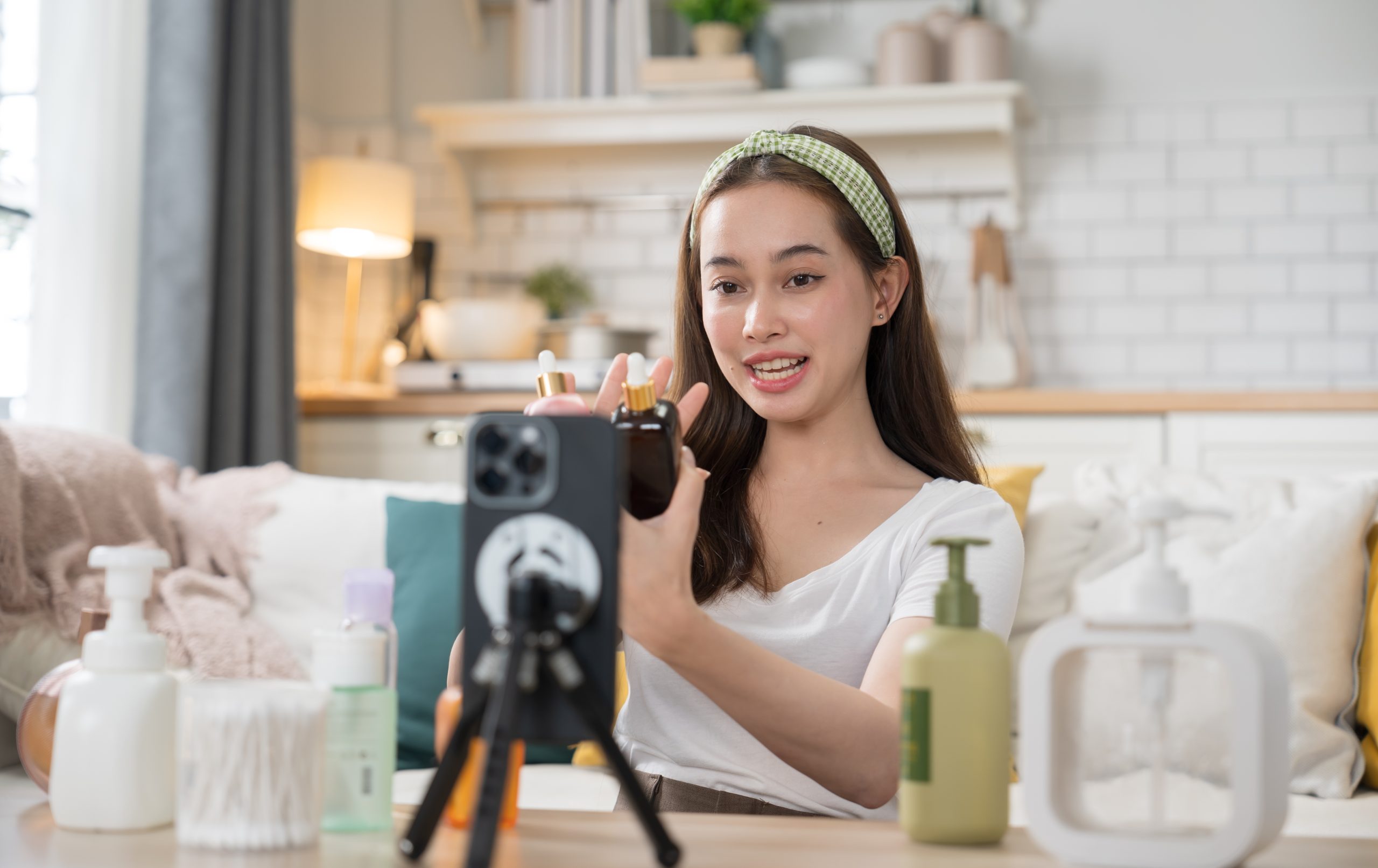 A beauty influencer creating a short-form video. This digital marketing trend remains popular.